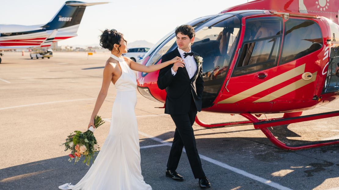 a bride and groom exit a Las Vegas helicopter flight to the Grand Canyon for their wedding
