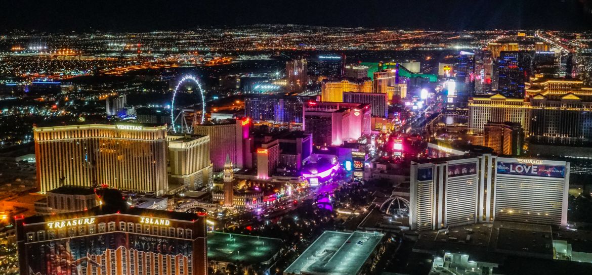 The Las Vegas Strip lights at night photo taken from the inside of a helicopter.