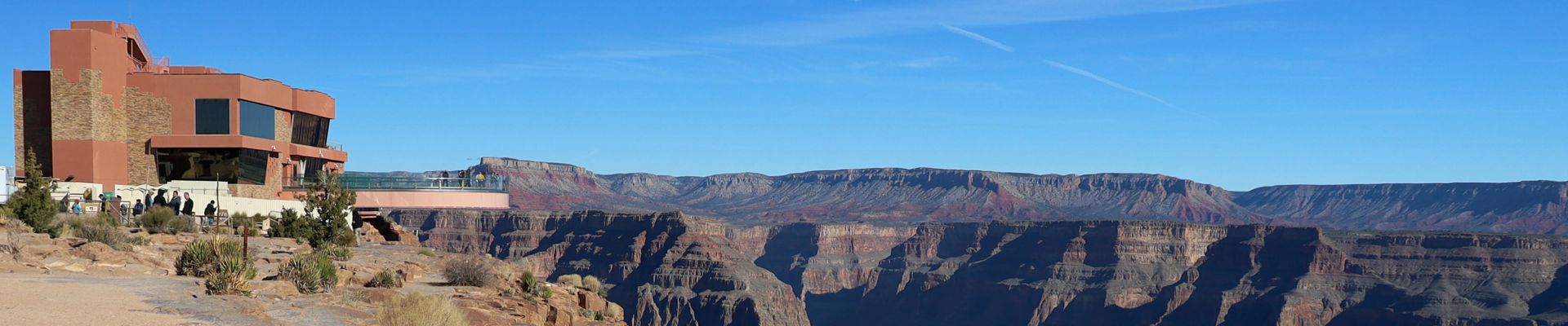 Guests on the Glass Bridge during a tour from Las Vegas to Grand Canyon Skywalk