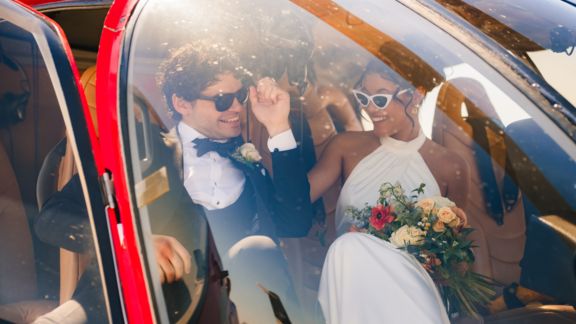 a wedding couple boards a flight for a Las Vegas helicopter tour