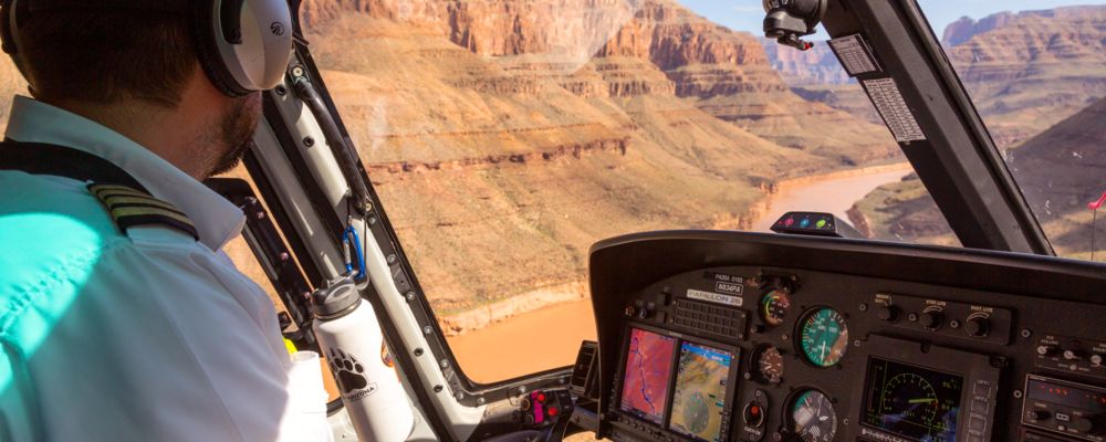 the view from inside a Grand Canyon helicopter tour sitting near the pilot