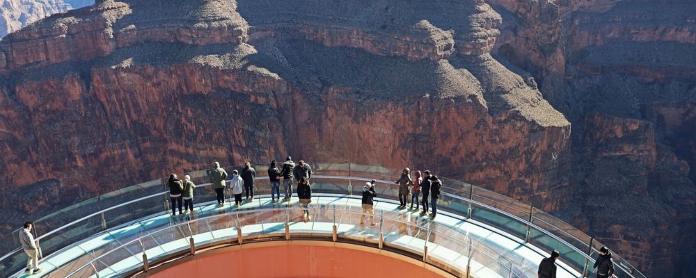 Visitors to the Grand Canyon West stand atop the glass-bottomed Skywalk Bridge
