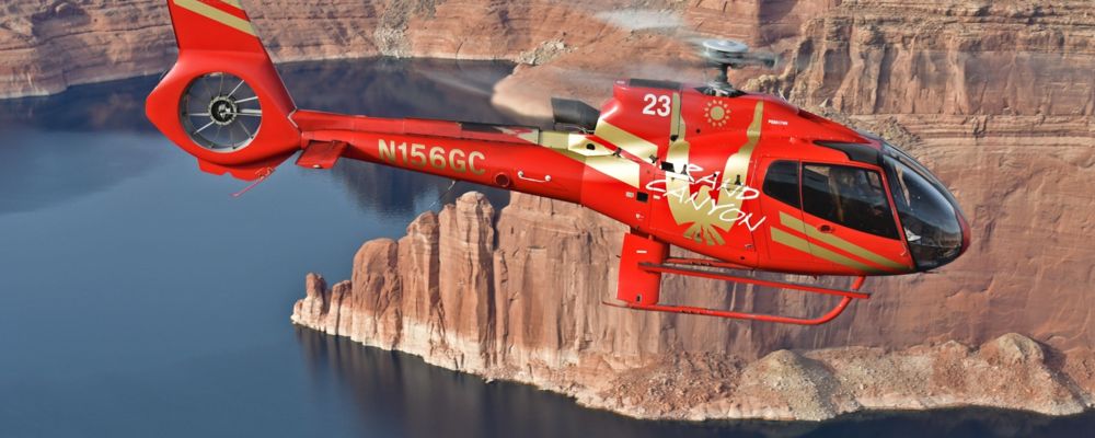 A helicopter flying over Lake Mead on the way to Grand Canyon West Rim.