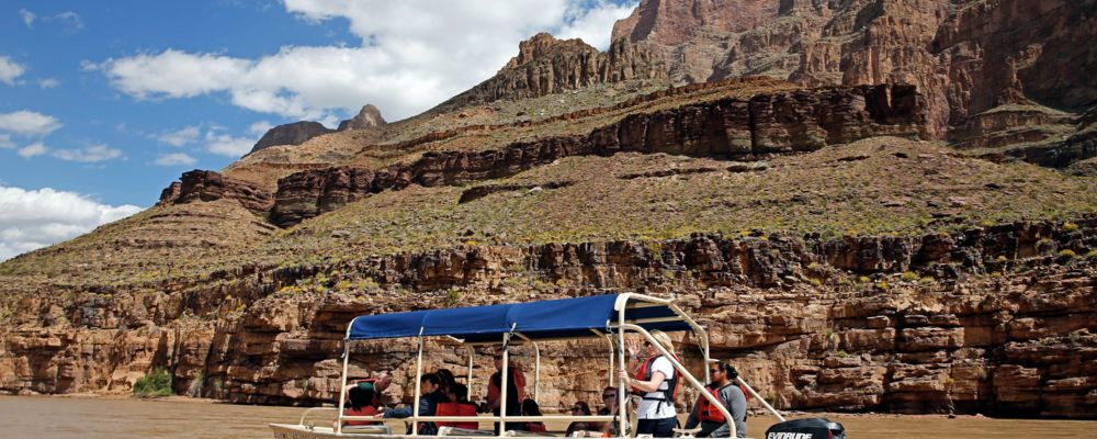 A Pontoon Boat on the Colorado River at the bottom of the Grand Canyon.