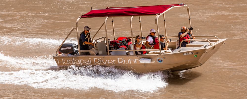  A group of people on a Pontoon Boat trip along the Colorado River.