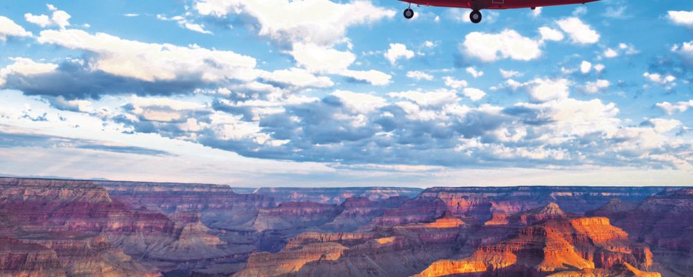 An Vistaliner Airplane flying over Grand Canyon during aerial flight.