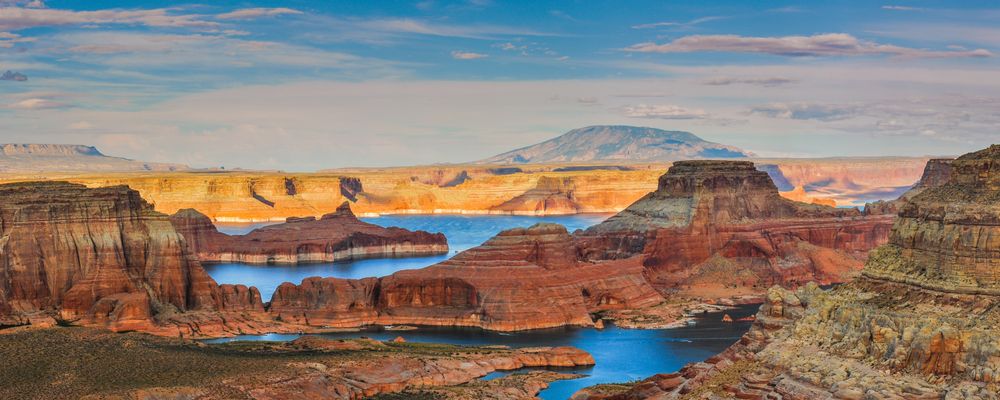 Orange rock formations twist throughout Lake Powell
