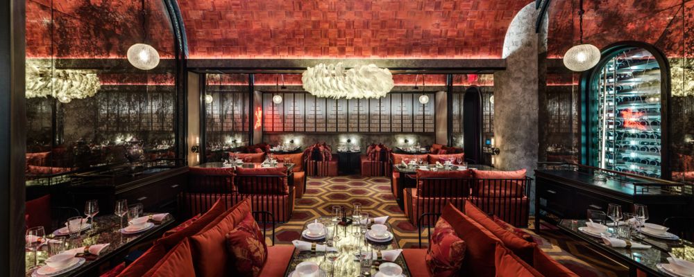 Interior photo of Mott 32 restaurant, included with this Dinner and helicopter tour package.