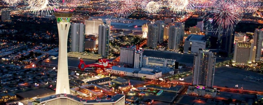 A massive fireworks display erupting over the Las Vegas Strip