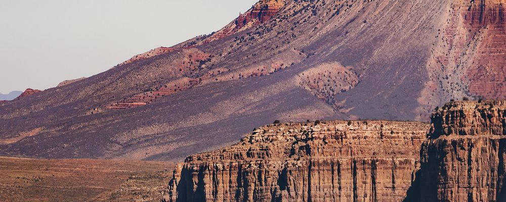A stark stone cliff located within the gorges of the Grand Canyon