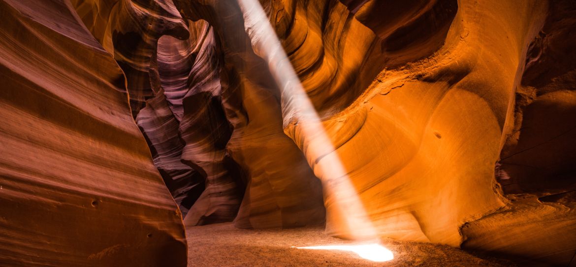 an interior shot of a sandstone corridor within Antelope Canyon