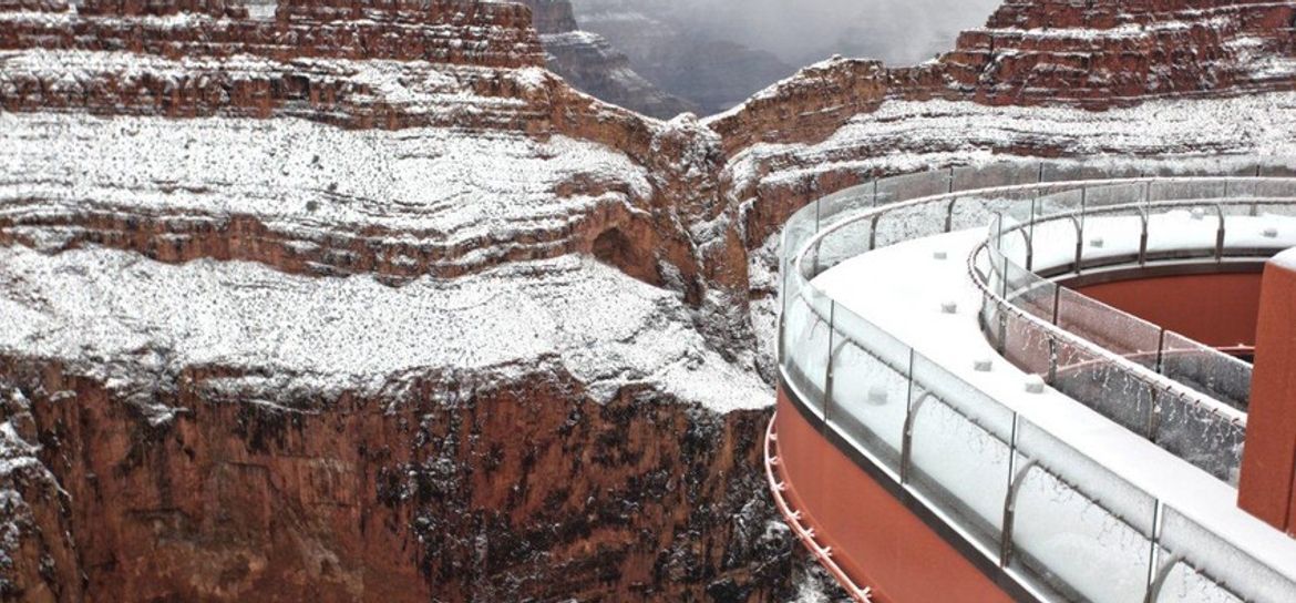 the Skywalk Bridge at the Grand Canyon West coated in snow during wintertime