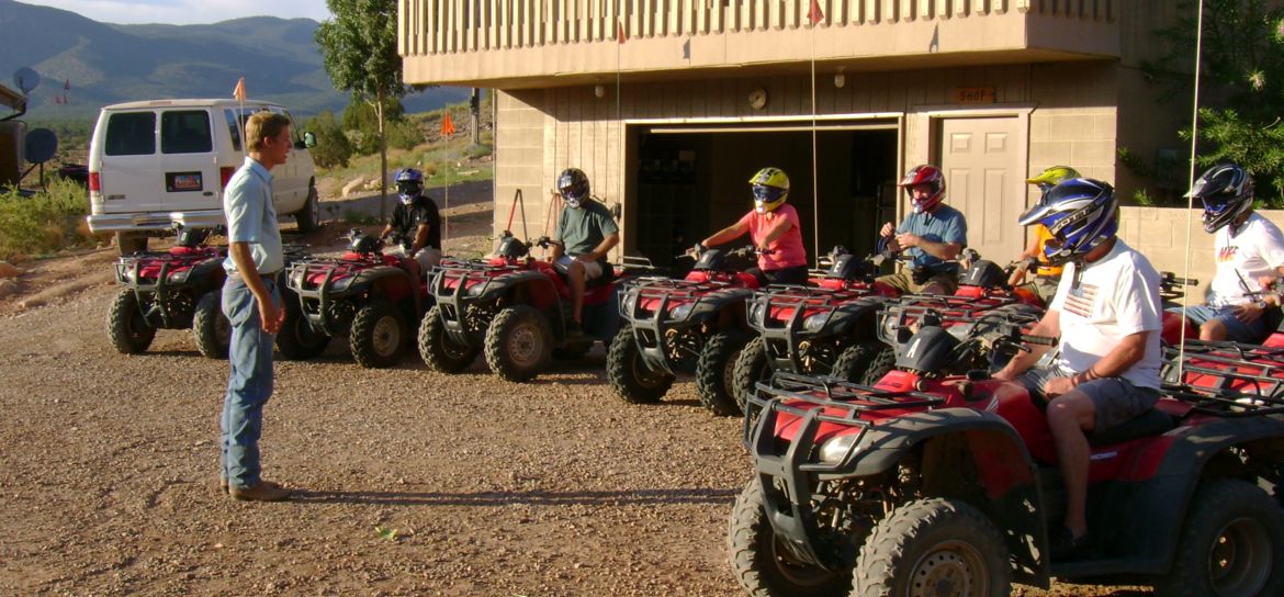 passengers receiving a safety brief before an ATV tour