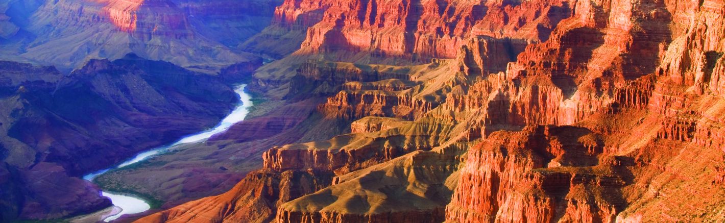 a panoramic view of the grand canyon national park at sunset