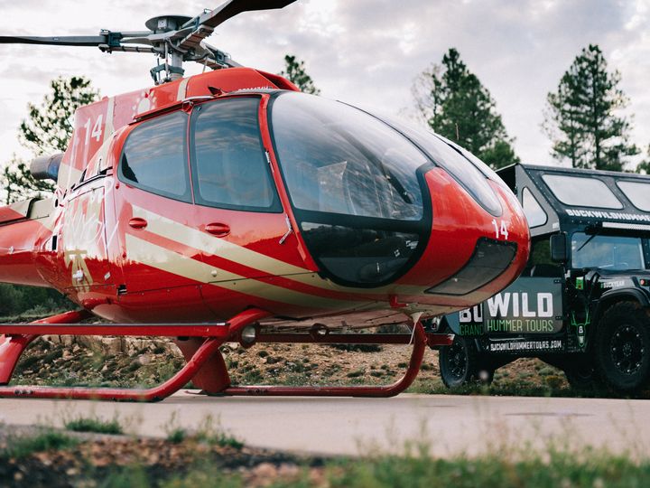 hummer and heliopter on Tarmac