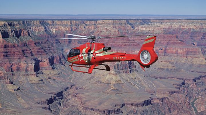 RS13622_HeliCanyon-EC130SouthRim_EDIT-heli-flying-below-the-rim-of-grand-canyon