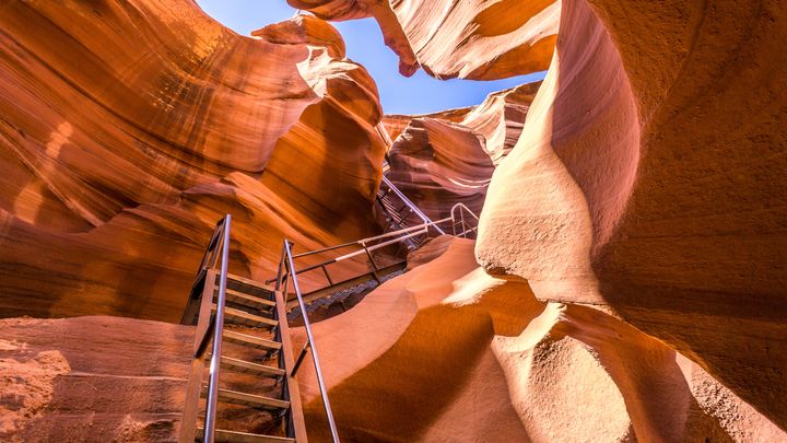 RS18709_AdobeStock-step-ladders-going-up-canyon-walls-at-lower-antelope-canyon