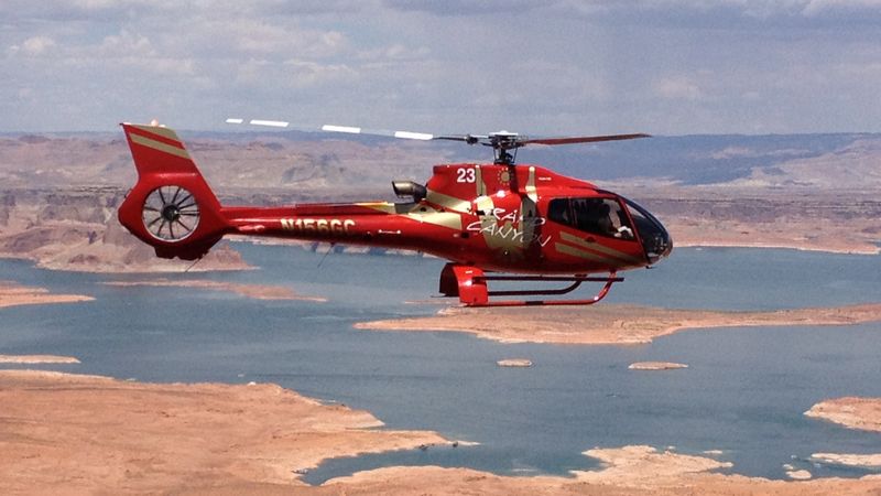 RS8151_freeze7-red-ec-130-flying-over-lake-powell-facing-right