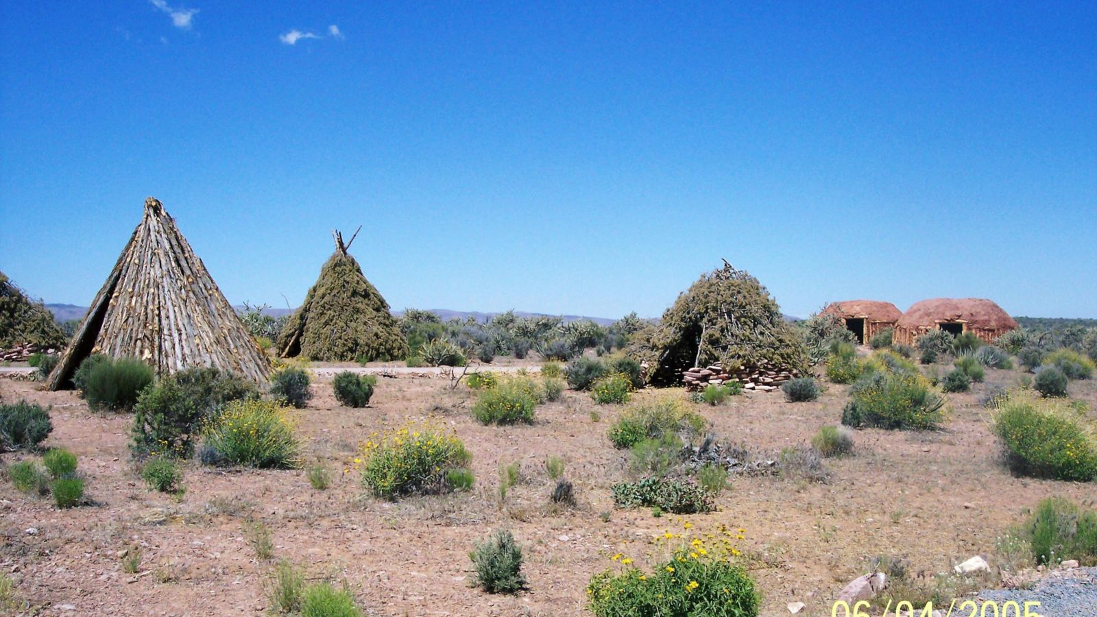 Native American example dwellings on display as part of a Grand Canyon Tour.