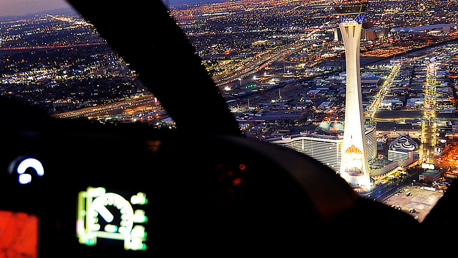 view of the STRAT tower from inside a las vegas helicopter tour