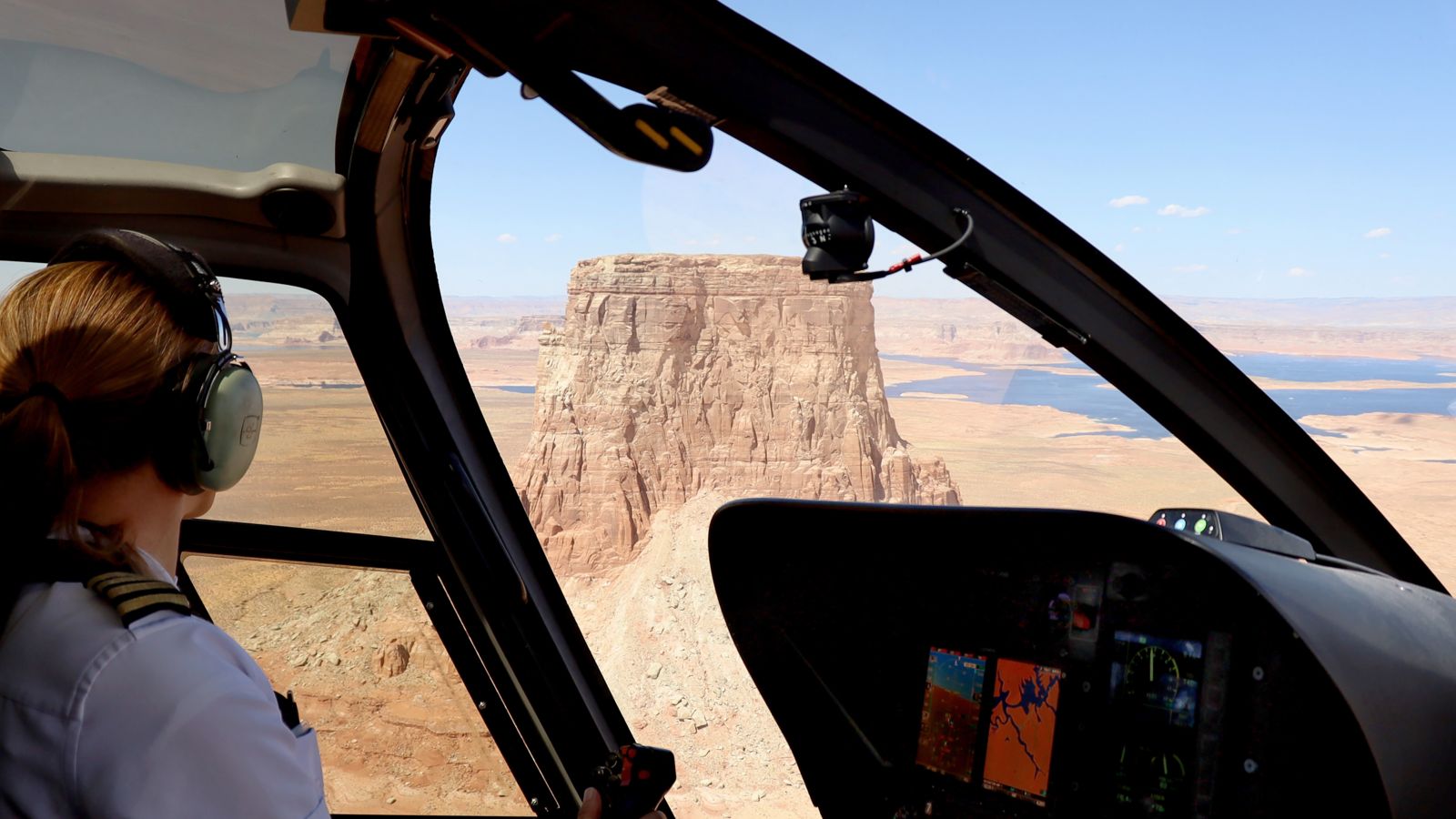 tower butte coming into view on a helicopter tour in page arizona