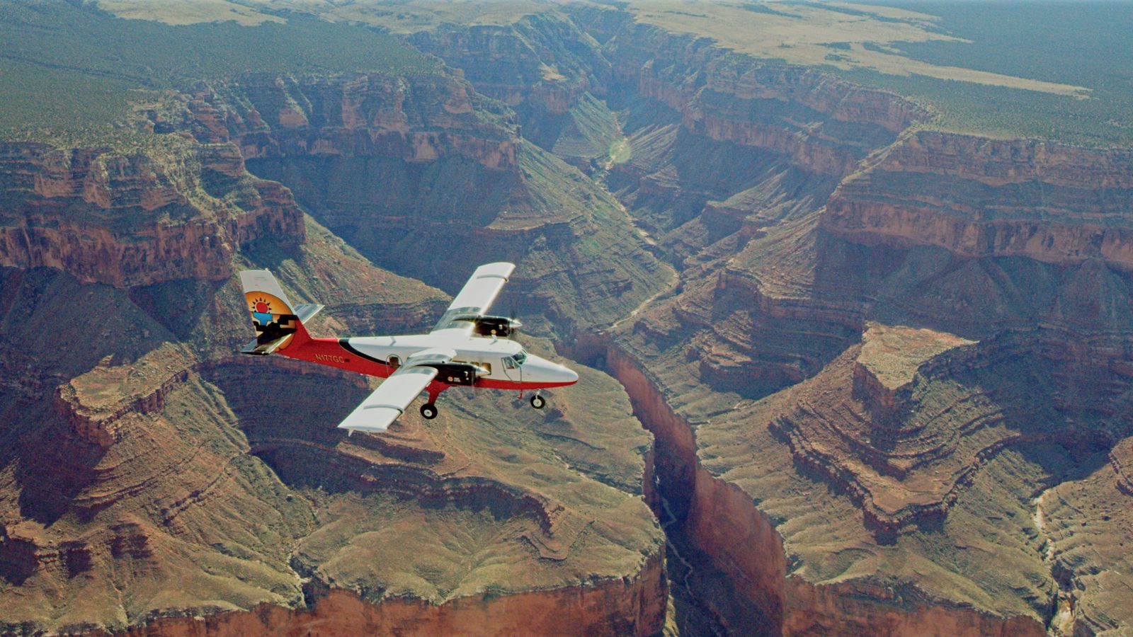 sightseeing airplane tour flying over Grand Canyon South Rim.