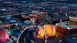 A Las Vegas helicopter tour flies over the Strip casinos at night