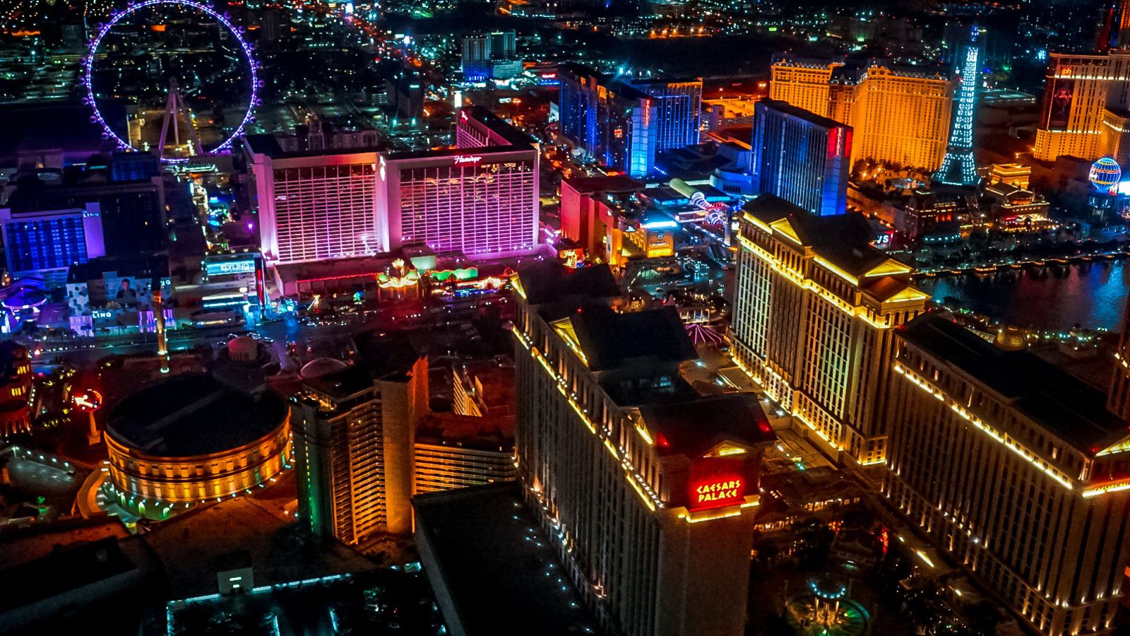 the illuminated casinos of the Strip seen from the sky on a Las Vegas helicopter tour