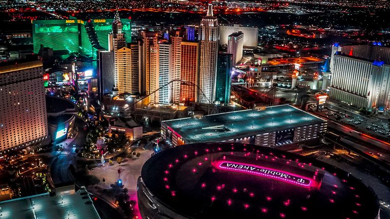 The neon pink T-Mobile Arena seen from a Las Vegas helicopter tour