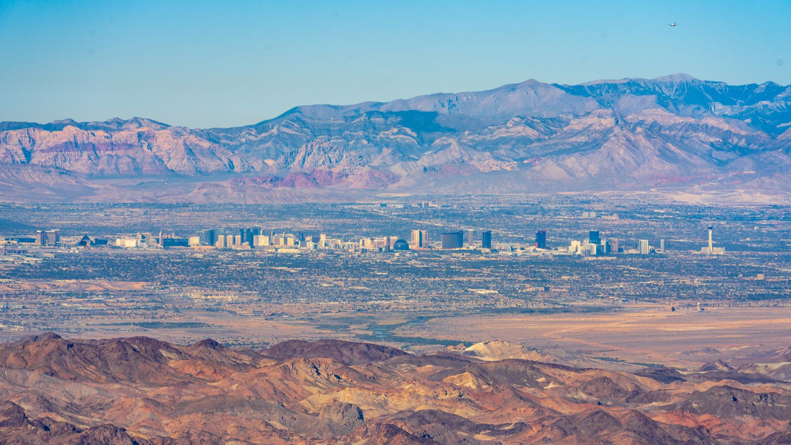 the Las Vegas Strip seen from a distance with mountains in the background