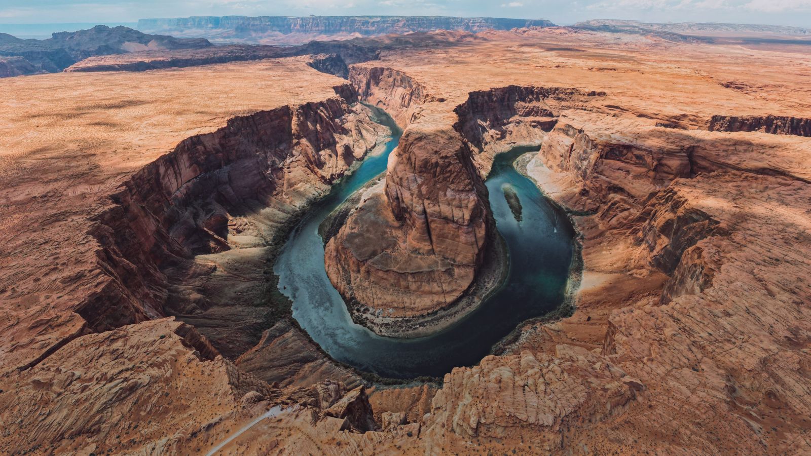 aerial view of horseshoe bend seen from a page arizona helicopter tour