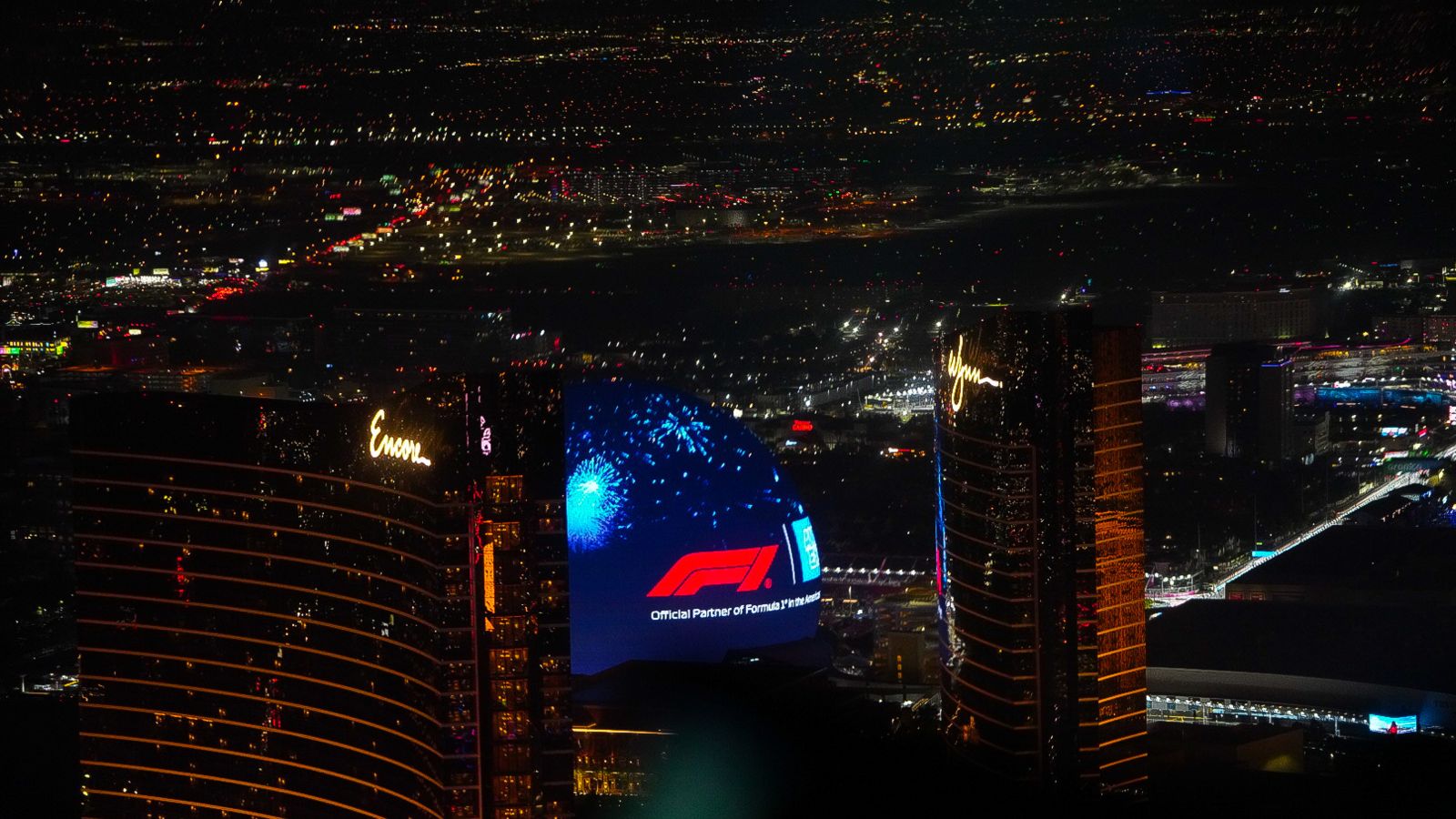 las vegas strip hotels during race at night seen from helicopter tour