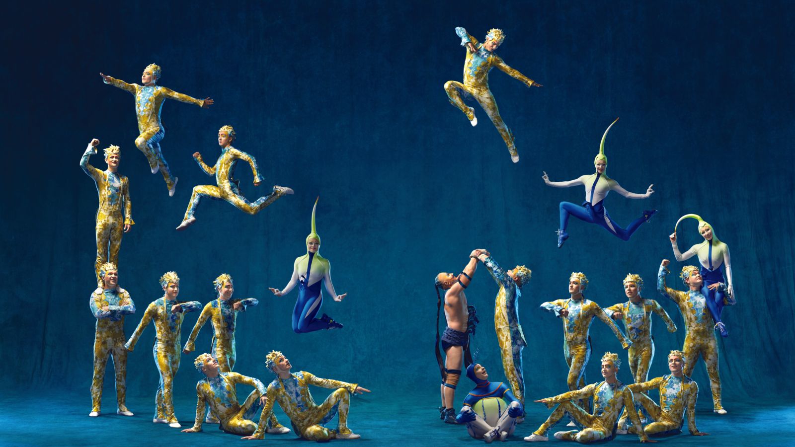 Performers with Cirque du Soleil mid-act on stage