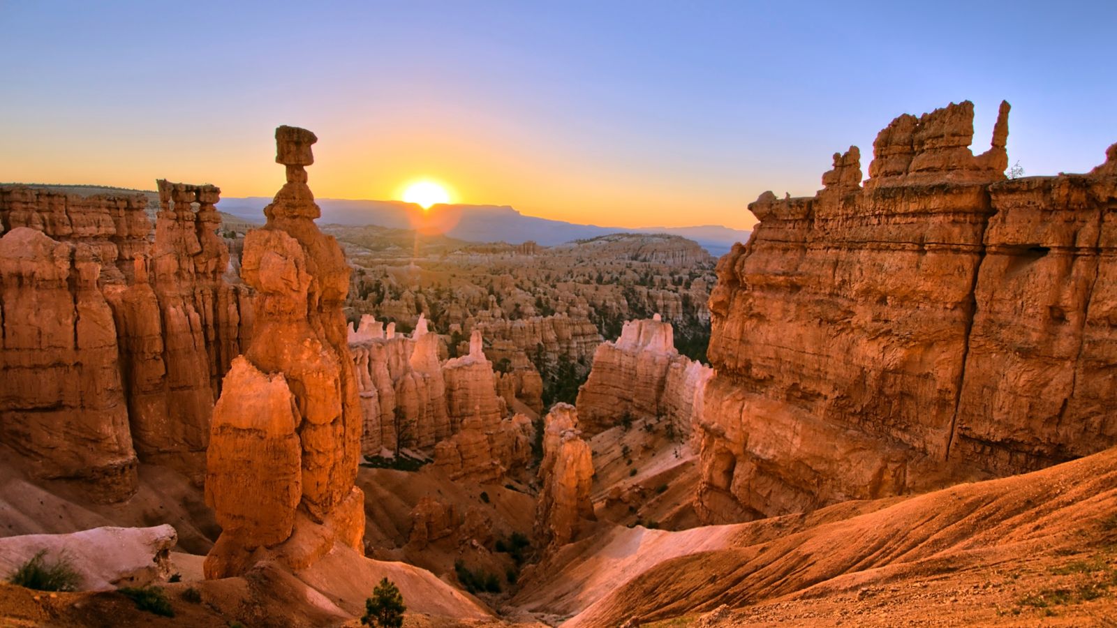 a scenic landscape of Bryce Canyon seen at sunset