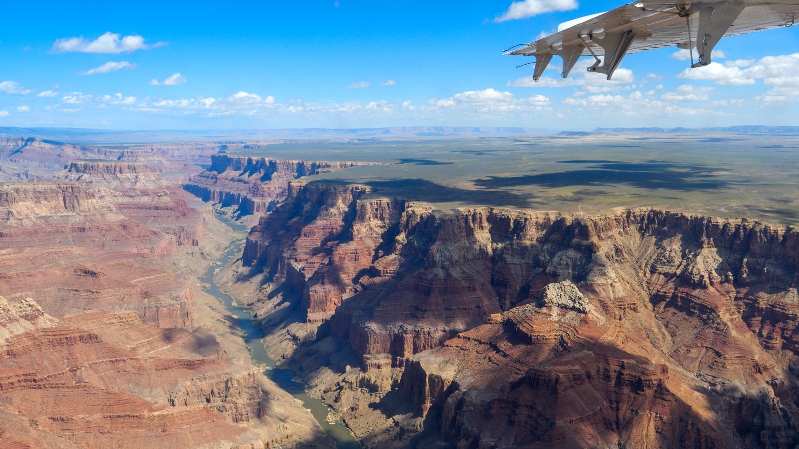 The Grand Canyon's East Rim seen from an airplane tour window