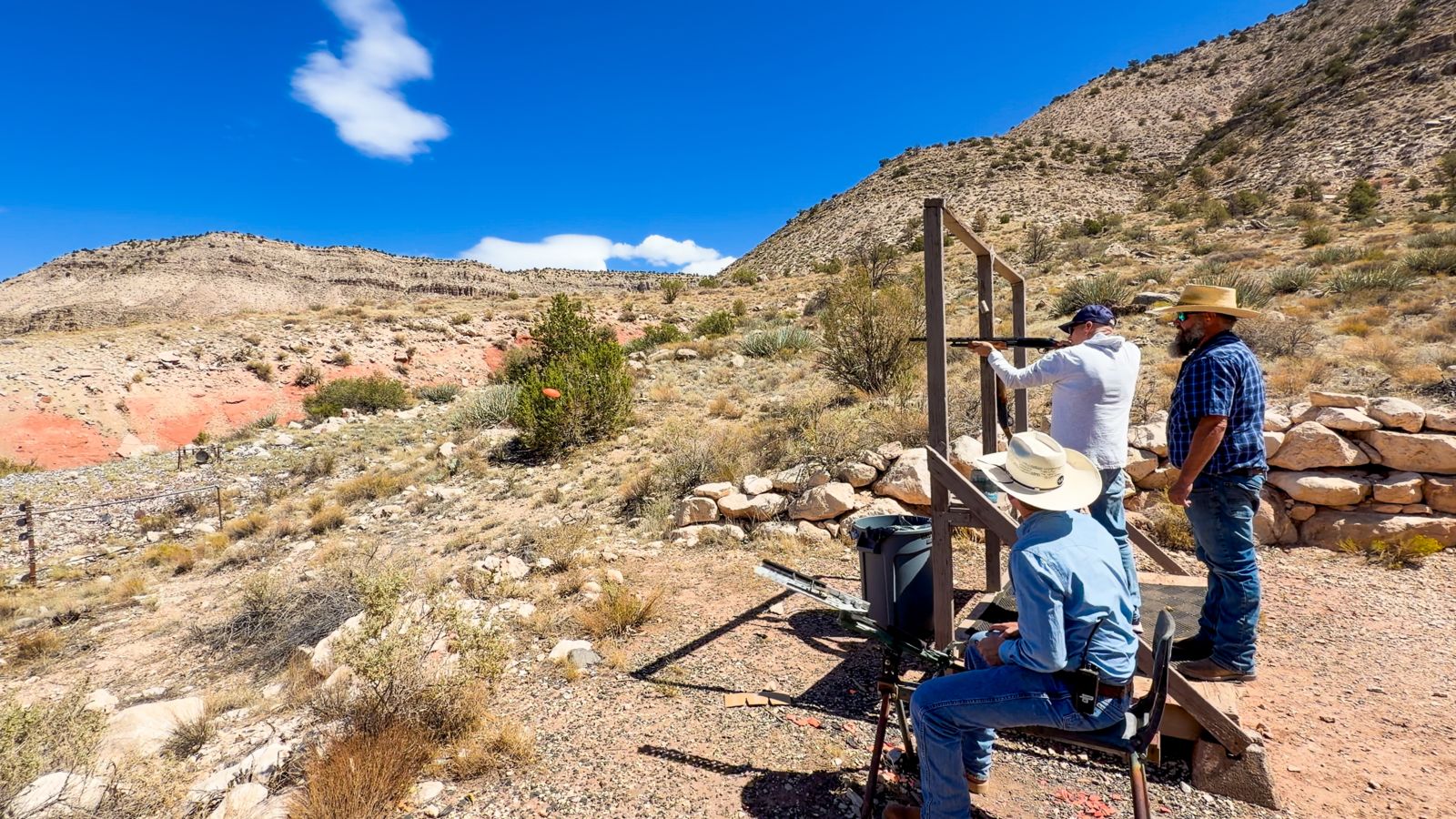 A skeet shooting session taking place during a tour at Bar 10 Ranch