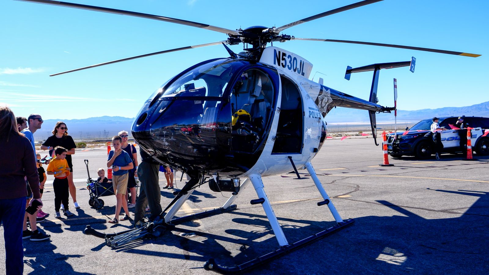 Visitors during Boulder City Airport Day learn about a Las Vegas police helicopter