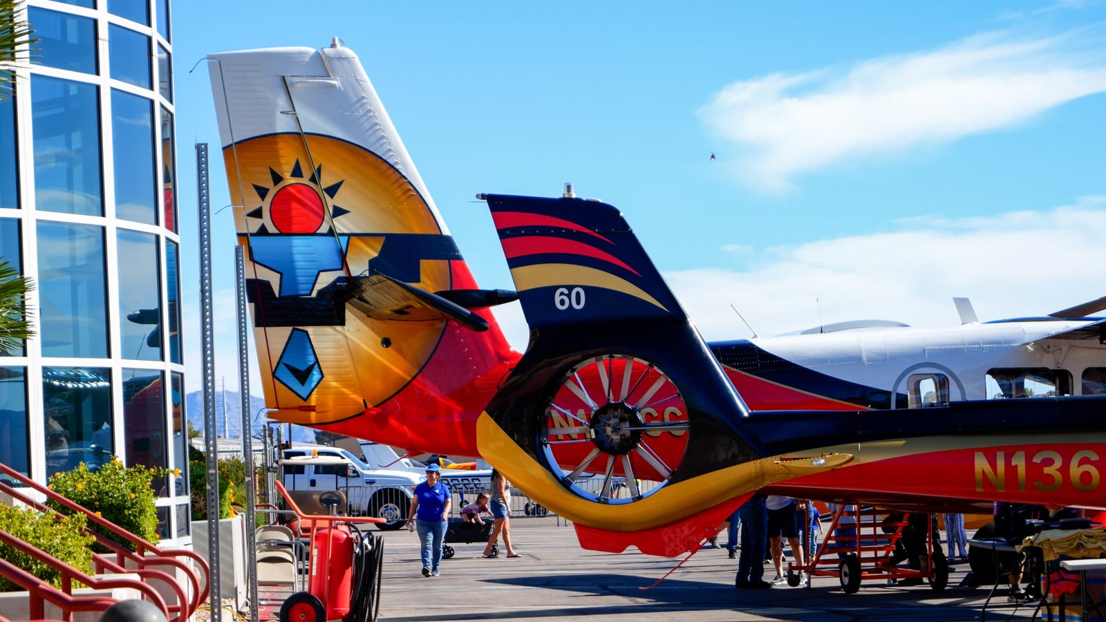 A Papillon airplane and helicopter seen from behind