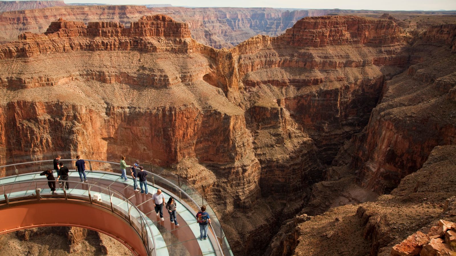 Guests walking over the Grand Canyon on the world famous Skywalk Bridge