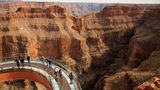 Guests walking over the Grand Canyon on the world famous Skywalk Bridge