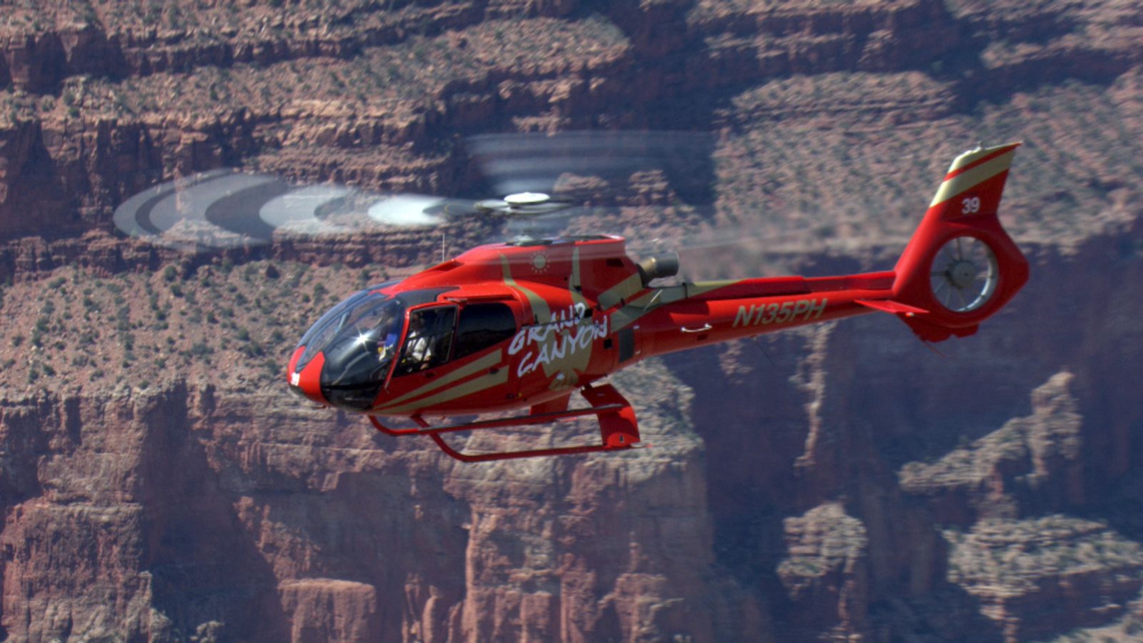 a helicopter tour flies over the grand canyon south
