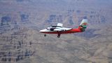 a sightseeing airplane tour flies over the Grand Canyon South Rim