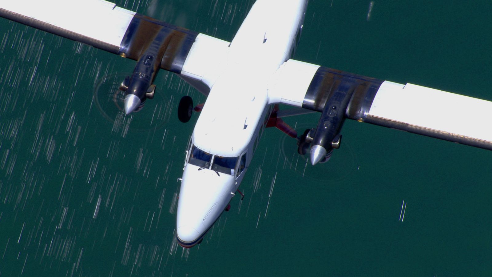 an aerial view of an airplane tour flying over the crystal waters of Lake Powell