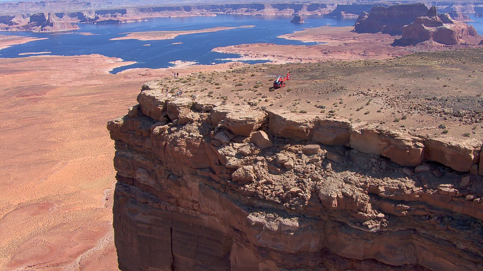 a helicopter tour landed at the top of tower butte in page arizona