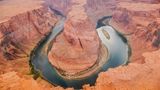 The world famous green and blue semicircle of Horseshoe Bend