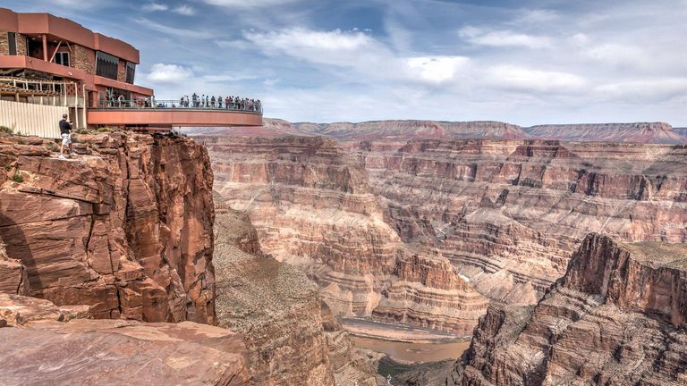 the Grand Canyon Skywalk Bridge in the distance of a wide view of the West Rim