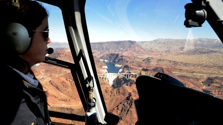 a view of Hoover Dam seen from the sky inside a Las Vegas helicopter tour