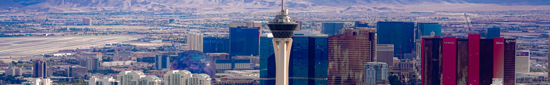 the Las Vegas Strip with the Stratosphere Tower in the forefront