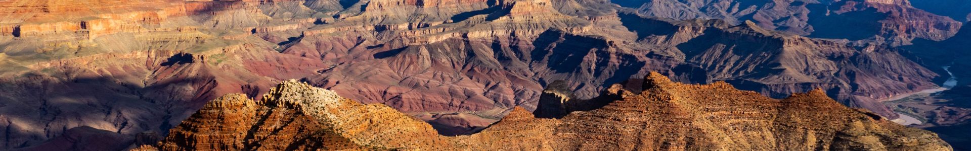 expansive view of Grand Canyon national park stone walls at daytime