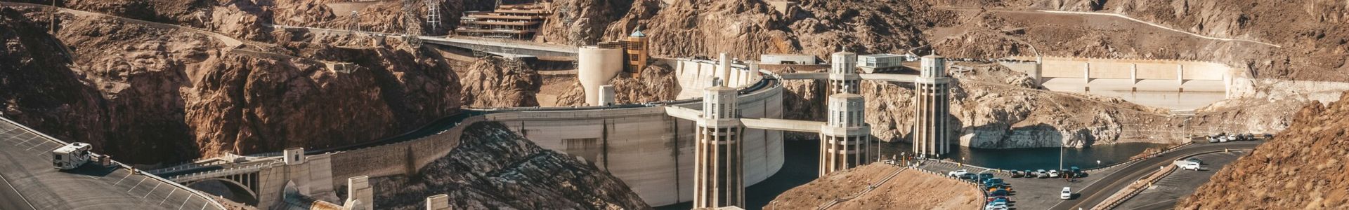 Hoover Dam entry with a large parking lot in the foreground